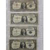 Image 1 : Four US Treasury Blue-Seal Silver Dollar Notes in Protective Binder Page - AFV $4
