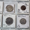 Image 10 : Two Binder Pages Filled with Assorted World Coins: Switzerland, France, Sweden, Italy, & More!