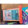 Image 5 : Pokemon Lunch Tin, Mini Binder & Assortment of Pokemon Trading Cards