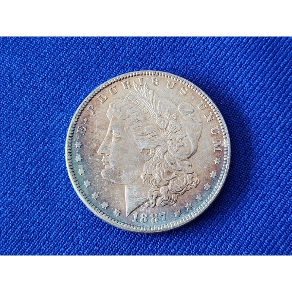 Toned 1887 90% Silver Morgan Dollar