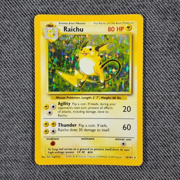 Raichu 14/102 Holo Rare Vintage Base Set Pokemon Trading Card in Near Mint Condition!