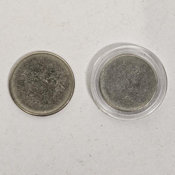 Two Unstruck Blank Coin Planchets