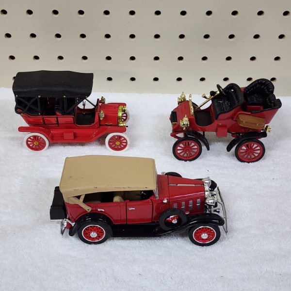 Three Assorted Collectible Die Cast Scale Replica Collectible Cars 