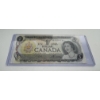 Image 2 : 1973 Canada Queen Elizabeth One Dollar Bill in Protective Holder- Mint Condition 