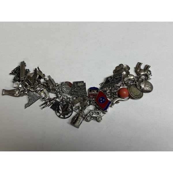 Sterling Charm Bracelet- 92.9 Grams - Lots of charms 