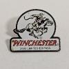 Image 2 : Three Vintage Pewter and Metal Collectible Pins featuring Brands like Winchester and Colt