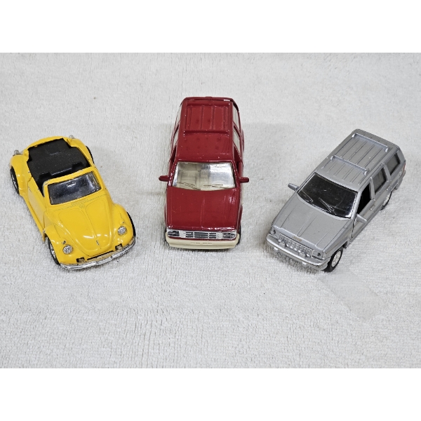 Three Miniature Die-Cast Toy Vehicles - 1:64 Scale