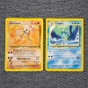 Image 1 : Two Non Holo Rare Vintage Pokemon Trading Cards ~ Fossil Set Hitmonlee & Neo Revelation Kingdra 