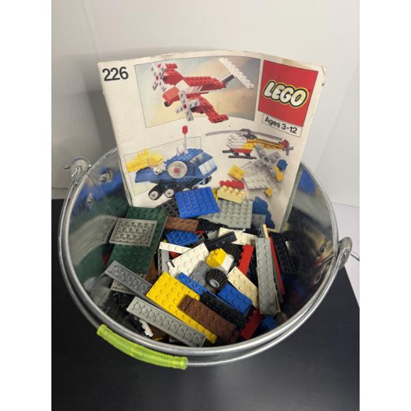 Galvanized Steel Bucket full of Miscellaneous Legos with Lego Builiding Book