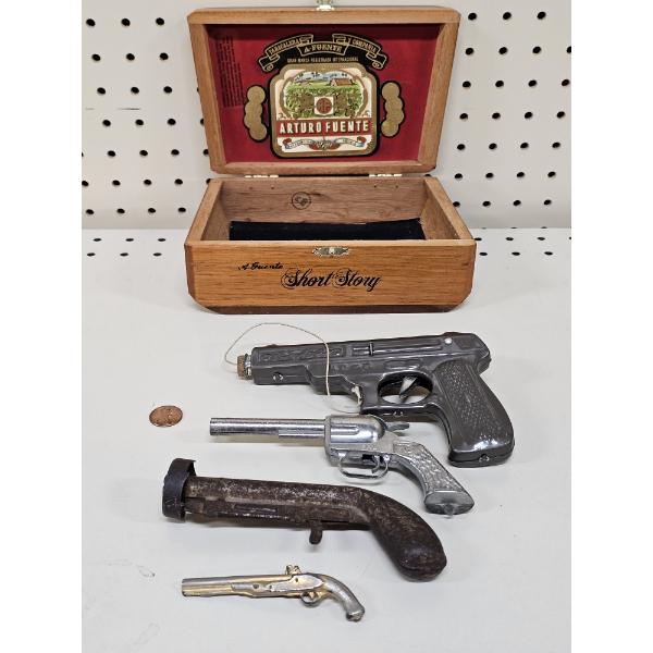 Four Assorted Vintage Toy Firearms with Wooden Box