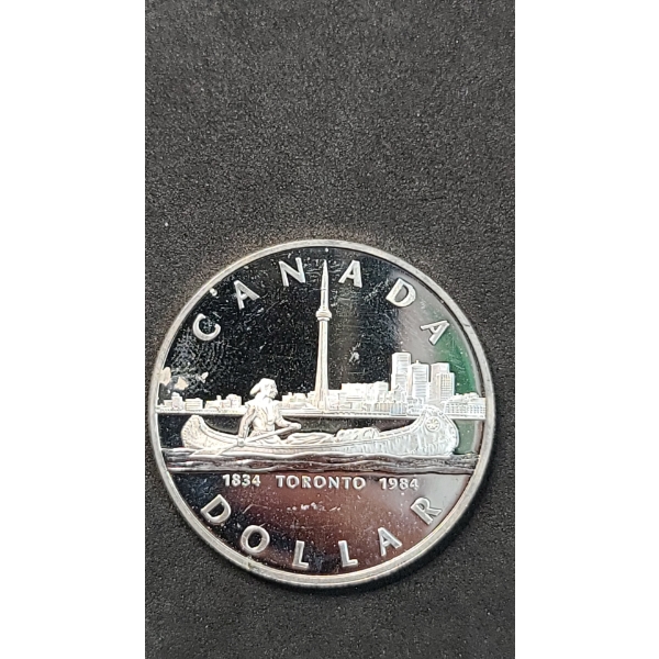 1984 Canadian 150th Anniversary (Sesquicentennial) Of Toronto 50% Silver Dollar - ASW: 0.375oz