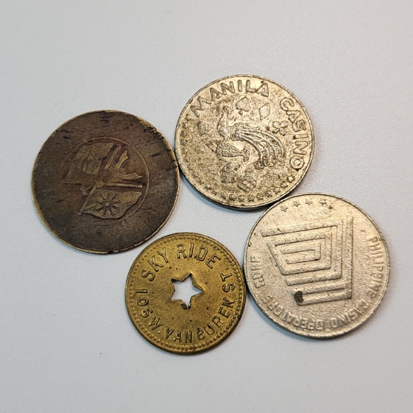 Four Collectible Tokens Including Manila Casino, Sky Ride Can Buren