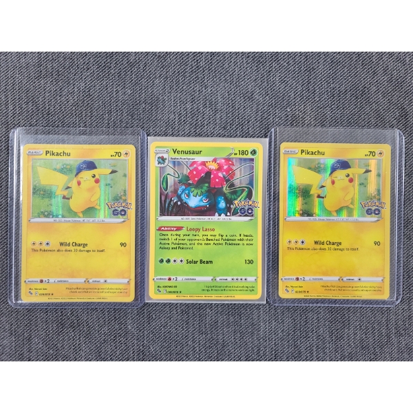 Three 2021 Pokemon Go Holofoil Trading Cards - 2 Pikachu & 1 Venusaur
