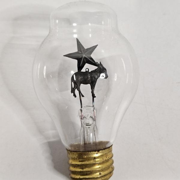 Vintage Aerolux Light Corporation Gas-Discharge Neon Glow Bulb, featuring a Donkey and Star Theme