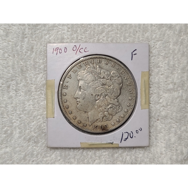 1900-O/CC Morgan Silver Dollar in Like Fine Condition
