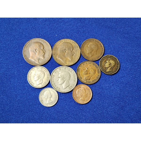 Lot of Assorted UK Coins Including Schillings, Pennys, Six Pence