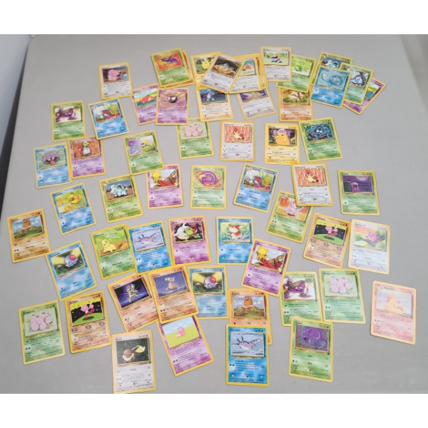 Large Assortment Of Pokémon Trading Cards Including Some Vintage  