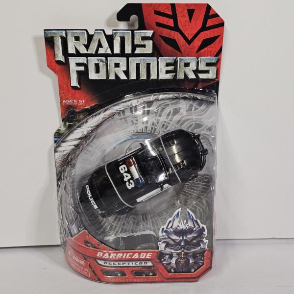 Hasbro Transformers 2007 Movie Deluxe Class Decepticon Barricade Action Figure