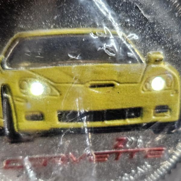 RARE!!! COLLECTOR'S EDITION!!! GM 100th Anniversary Chevrolet Corvette Z06 Light-Up $1 Coin