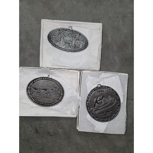 Three Mount Union Medals In Boxes