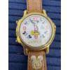 Image 1 : Vintage Lorus Disney Mickey Mouse Musical Watch with Brown Leather Band & gold-tone Case 