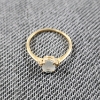 Image 1 : 14K Yellow Gold Ring Ft. Clear Center Stone ~ Size 6 ~ Weighs 1.5 Grams Total