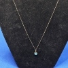 Image 1 : 10k Gold Pendant with Turquoise on a Golf Filled Chain - 1.3g TW