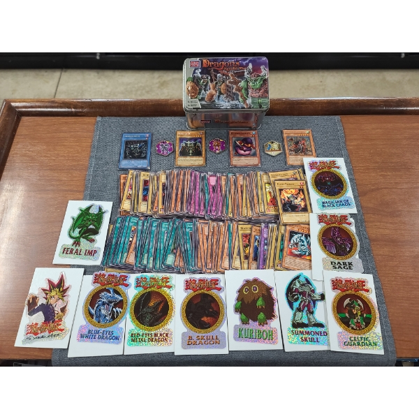 Tin Loaded With Yu-Gi-Oh Trading Cards & Vending Machine Stickers Featuring A Few Holos!