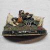 Image 1 : Antique Cast Iron Doorstop depicting Three Puppies playing around an Overturned Flower Pot