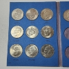 Image 3 : Eisenhower Dollar Collection Book Including 12 $1 Eisenhower Coins - FV: $12.00