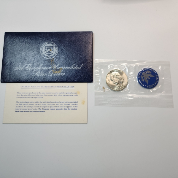 United States Mint 1974 40% Silver Uncirculated Eisenhower Dollar in Original Blue Packaging