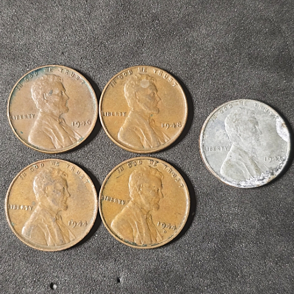(4) Wheat Pennies and (1) Steel Penny