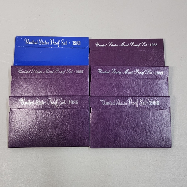 Six Assorted United States Mint Proof Sets: 1983, 1988, 1989, 1989, 1986, 1986