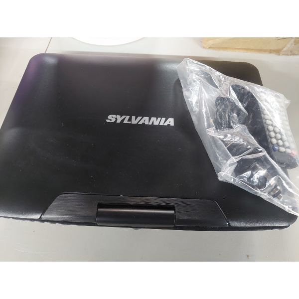 Sylvania Portable DVD Player - Includes Manual  See Pics