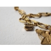 Image 8 : 14K Gold 7in Charm Bracelet with Various 14K Gold Charms TW: 14.0g