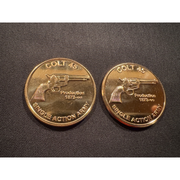 2 - Smith & Wesson Colt 45 .999 Fine Copper One Troy Ounce Coins