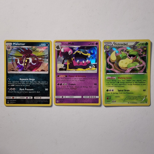 Three Assorted Vintage Holo Rare Pokemon Trading Cards 