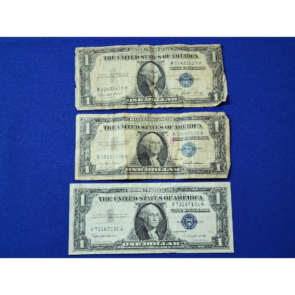 (3) $1 Dollar Bill Silver Certificates: 1935-E, 1957, 1957-B