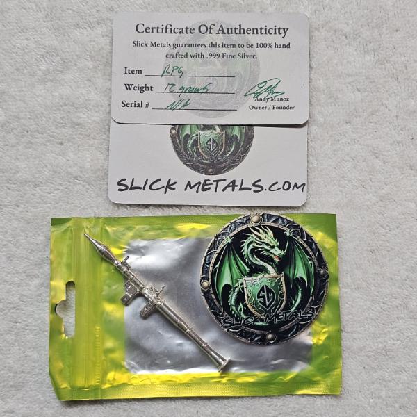 Slick Metals .999 Fine Silver RPG With Dragon Shield Logo Round Sticker And CoA - ASW 12g