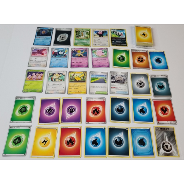 Assorted Pokemon TCG Cards Including Holo With Swirl! 