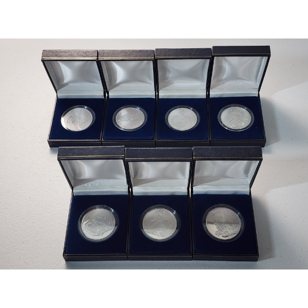 Lot of 7 Dale Earnhardt Official Commemorative Silver-Plated Coins Designs by Sam Bass