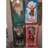 Image 1 : 4 Boxed Animated Classic Christmas Dolls