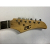 Image 9 : Modified B.C. Rich Warlock electric guitar with a custom painted red, yellow, and black finish 