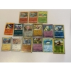 Image 1 : 15 Pokémon Cards - Includes 035/202 Cinderace Rare (2) - Roselia 014/196 - Nacli 101/182 - Cottonee 