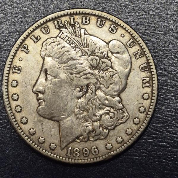 1896 O  Morgan 90% Silver Dollar - Mid Grade Circulated 