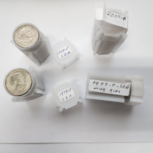 Four Assorted $25.00 Rolls of United States Dollar Coins - Total FV: $100.00