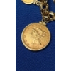 Image 8 : 14K Gold Charm Bracelet With Some 14K & 10K Gold Charms & 2 Gold Coins - TW: 57.1g 