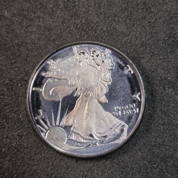1/10 Troy Ounce .999 Silver Round with Walking Liberty Motif