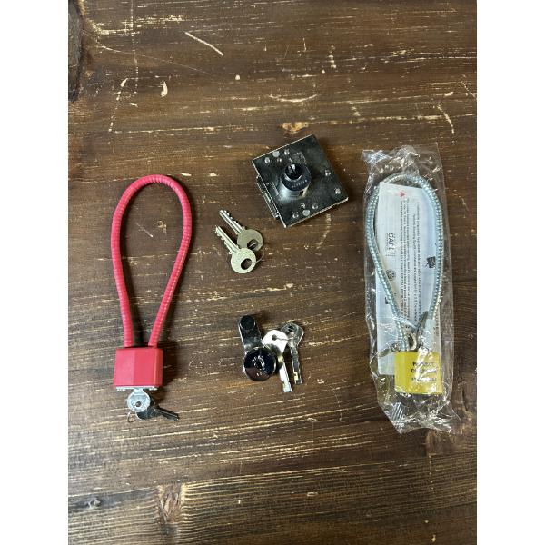 Gun Locks - Set of 4 gun locks - One Red - One still in package 