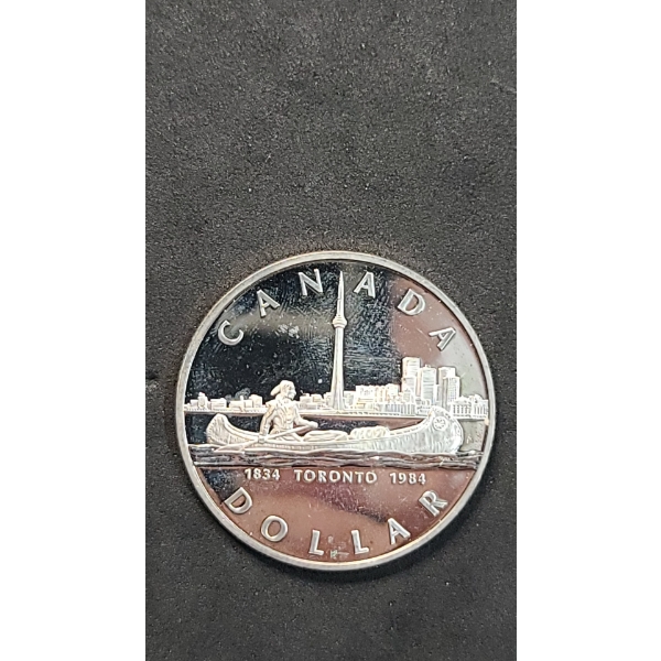 1984 Canadian 150th Anniversary (Sesquicentennial) Of Toronto 50% Silver Dollar - ASW: 0.375oz